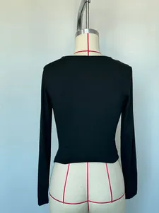 Detailed back view of a slim-fit black long-sleeve T-shirt for women on a mannequin.
