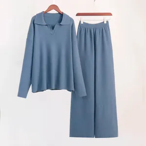 Elegant two-piece blue knit lounge set featuring Polo collar sweater and wide-leg pants