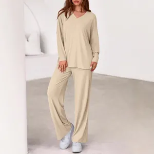 Casual women's two-piece set featuring a loose long-sleeve V-neck top and wide-leg pants