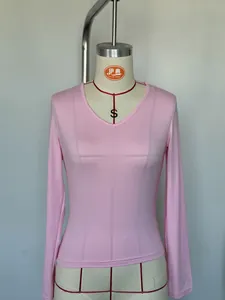 Detailed view of a soft pink V-neck long-sleeved slim fit milk silk T-shirt for women