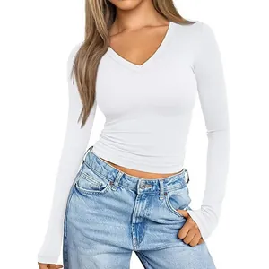 Close-up of white slim-fit V-neck long-sleeve shirt made of soft milk silk
