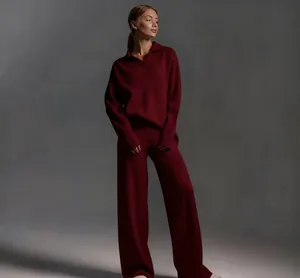 Full view of a stylish wine red Polo collar pullover and matching wide-leg pants.