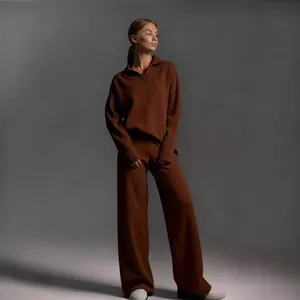 Elegant brown knit polo neck sweater and wide-leg trousers two-piece fashion set for women.