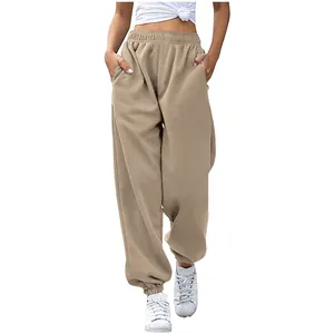 Close-up front view of women high-waisted loose khaki joggers featuring side pockets