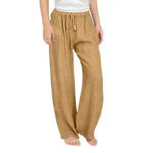 Close-up of girl's cotton linen wide-leg pants with elastic drawstring waist detail