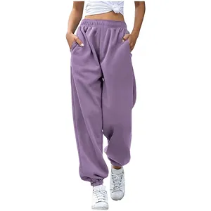 Front view showing women's lavender high-waisted loose joggers with side pockets.