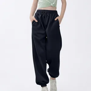 Pantalones de chándal holgados para niños con cintura elástica y puños de canalé.