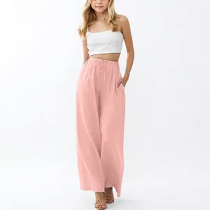 Pink linen wide-leg pants for girls with adjustable drawstring and practical side pockets