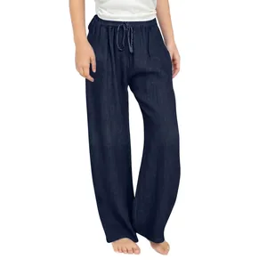 Detail of girls navy blue cotton linen wide leg trousers with elastic drawstring waist