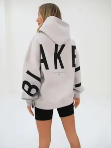 Oversized light grey hooded sweatshirt with black BLAKE letter print on the back