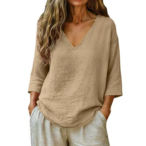 Detailed view of a women's casual loose khaki slub cotton top with an elegant V-neckline