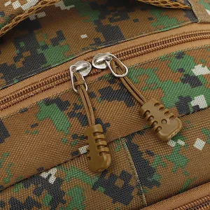 Close-up of durable double zippers on a digital camouflage backpack detail.