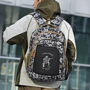 Detailed view of kids digital camouflage backpack featuring a decorative army soldier patch