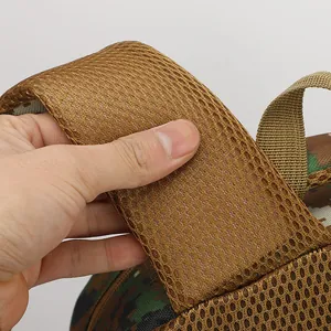 Close-up of thick breathable mesh shoulder strap on camouflage student backpack