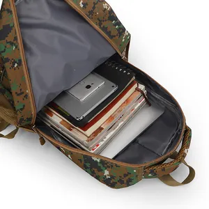 Detailed interior view of a large capacity camouflage school bag packed with books and a tablet