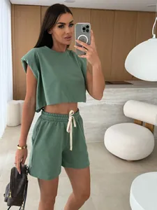Stylish green summer two-piece set with padded shoulder top and drawstring shorts
