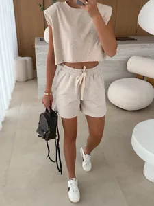 Close-up detail of the padded shoulder crop top and drawstring shorts loungewear set