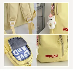 Detail views of light yellow minimalist backpack with cute bear keychain and logo.