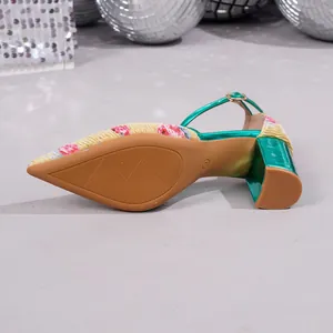 Elegant pointed toe block heel pumps with green metallic finish and floral pattern