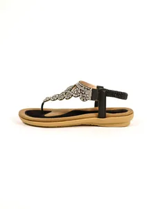 Side view of comfortable women's flat sandals featuring elegant rhinestone flower designs