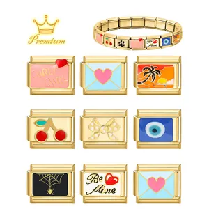 Gold Italian charms modular bracelet links with vintage enamel heart and cherry designs.