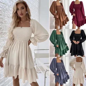 Elegant smocked square neck mini dress shown in various colors including beige and green