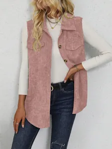 Detail shot of a women's pink corduroy vest featuring a lapel and button closure.