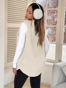 Back view of a cozy white faux lamb wool vest featuring a soft and plush sherpa texture