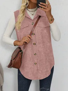 Close-up detail of women's pink corduroy vest with lapel and button-down front.
