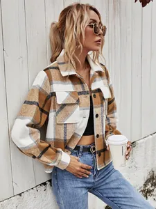 Trendy women's brown plaid short jacket shacket styled in a casual outdoor setting