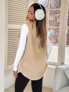 A close-up detailed view showcasing the soft faux shearling texture of this beige women's vest