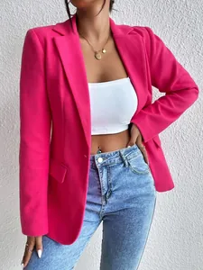 Detail view of a vibrant magenta slim-fit woolen blazer for a stylish commuter look.