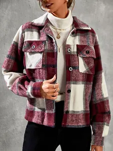Detail of women's burgundy plaid button-up jacket with pockets and turndown collar