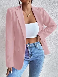 Detail showing the slim-fit cut and fabric texture of the pink woolen blazer jacket.