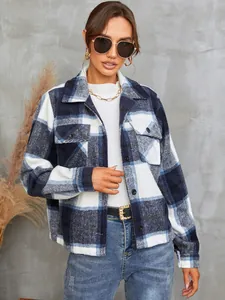 Detailed view of a fashionable women's blue and white plaid woolen lapel shirt jacket