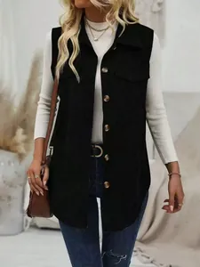 Detail showing the corduroy texture and button-down design of the black women's vest.