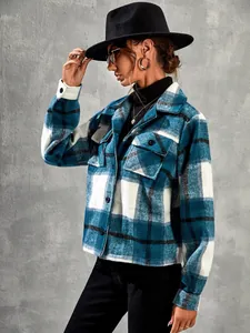 Side view of a stylish blue and white plaid wool jacket with lapel and button details