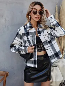 Stylish women's short black and white plaid jacket with lapels and single breasted buttons