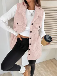 Detailed look at a pink teddy fleece vest with lapel and button closure on model