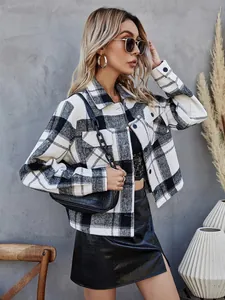 Chic black and white plaid wool jacket with lapel and single-breasted design detail