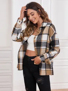 Detailed view of women's autumn brown plaid flannel jacket with lapel and buttons