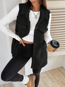 Detailed view of women's black fuzzy fleece vest jacket with lapels and buttons