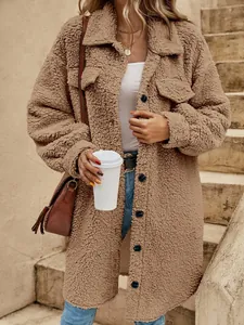 Close-up of a cozy long sherpa coat in camel with button details for winter