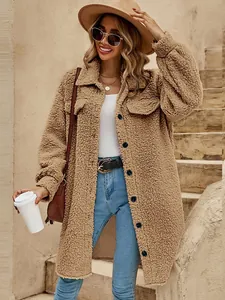 Close-up of women's long tan teddy fleece coat with button front and lapel collar