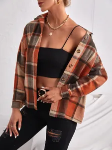 Close-up of a stylish plaid wool cardigan for women featuring a classic lapel design