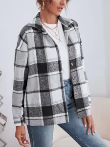Women's chic black and white plaid flannel shirt jacket with a classic lapel collar