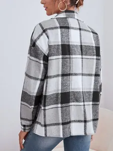 Back view of a classic black and white plaid wool blend jacket with lapel collar