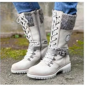Elegant white mid-calf lace-up boots featuring knitted cuffs and stylish side zippers