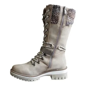 Detailed side view of mid-calf women winter boots with knitted cuff and side zipper