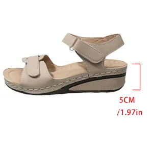 Detailed side view of the beige retro wedge sandal showing the 1.97 inch heel height
